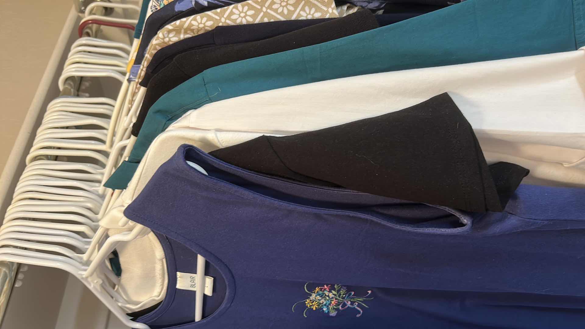 Photo 1 of WOMEN’S CLOTHING ASSORTMENT SIZE LARGE