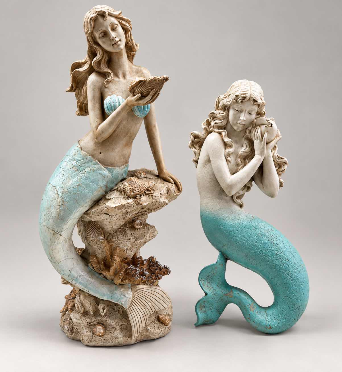 Photo 1 of TWO DECORATIVE MERMAID FIGURINES (TALLEST 18”)
