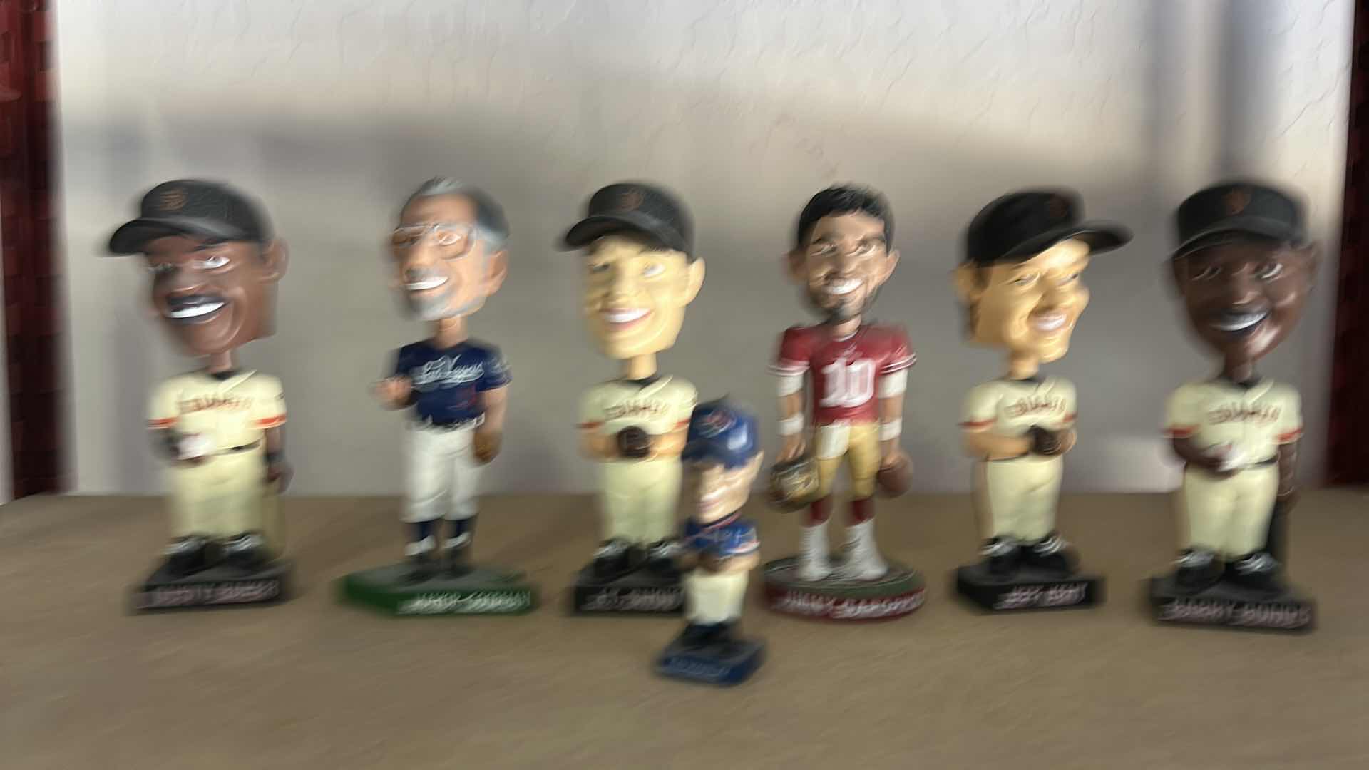 Photo 1 of SPORTS BOBBLEHEAD FIGURINES