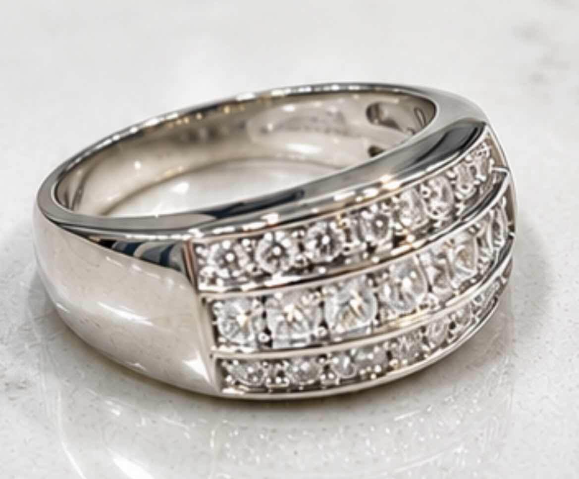 Photo 1 of 10K WHITE GOLD DIAMOND RING 
0.50 CTW 5.2G (EST SIZE 9-10) #43 $2,800