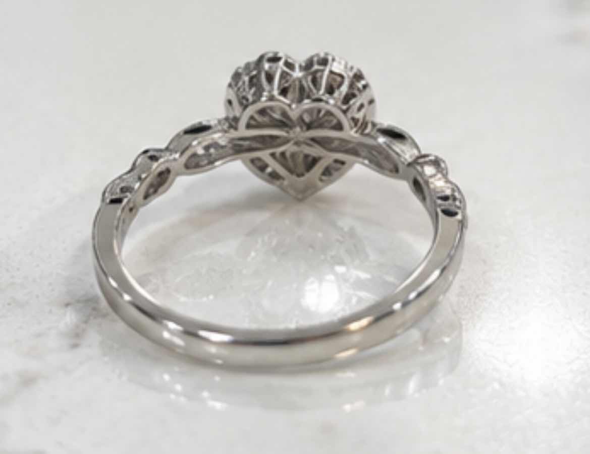 Photo 1 of 10K WHITE GOLD 0.50 CTW DIAMOND RING 2.4G (EST SIZE 6-7) #12 $2,100