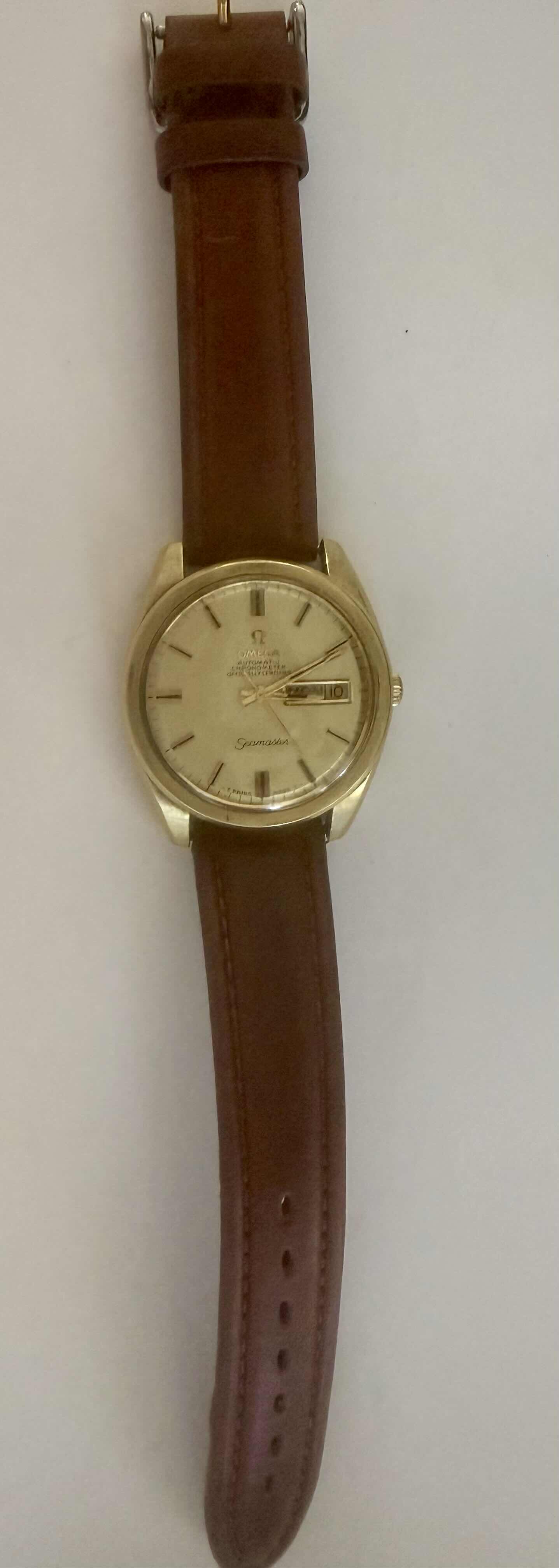 Photo 1 of VINTAGE OMEGA SEAMASTER WATCH W 14 KT GOLD CAP CASE  & CHAMPAGNE DIAL W DAY DATE