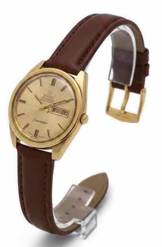 Photo 1 of VINTAGE OMEGA SEAMASTER WATCH W 14 KT GOLD CAP CASE  & CHAMPAGNE DIAL W DAY DATE