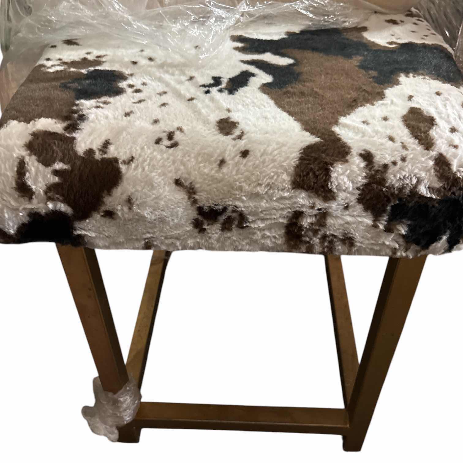 Photo 1 of BROWN, BLACK & CREAM FAUX COWHIDE UPHOLSTERED BENCH / OTTOMAN WITH GOLD METAL FRAME 51”X19.5”H23”