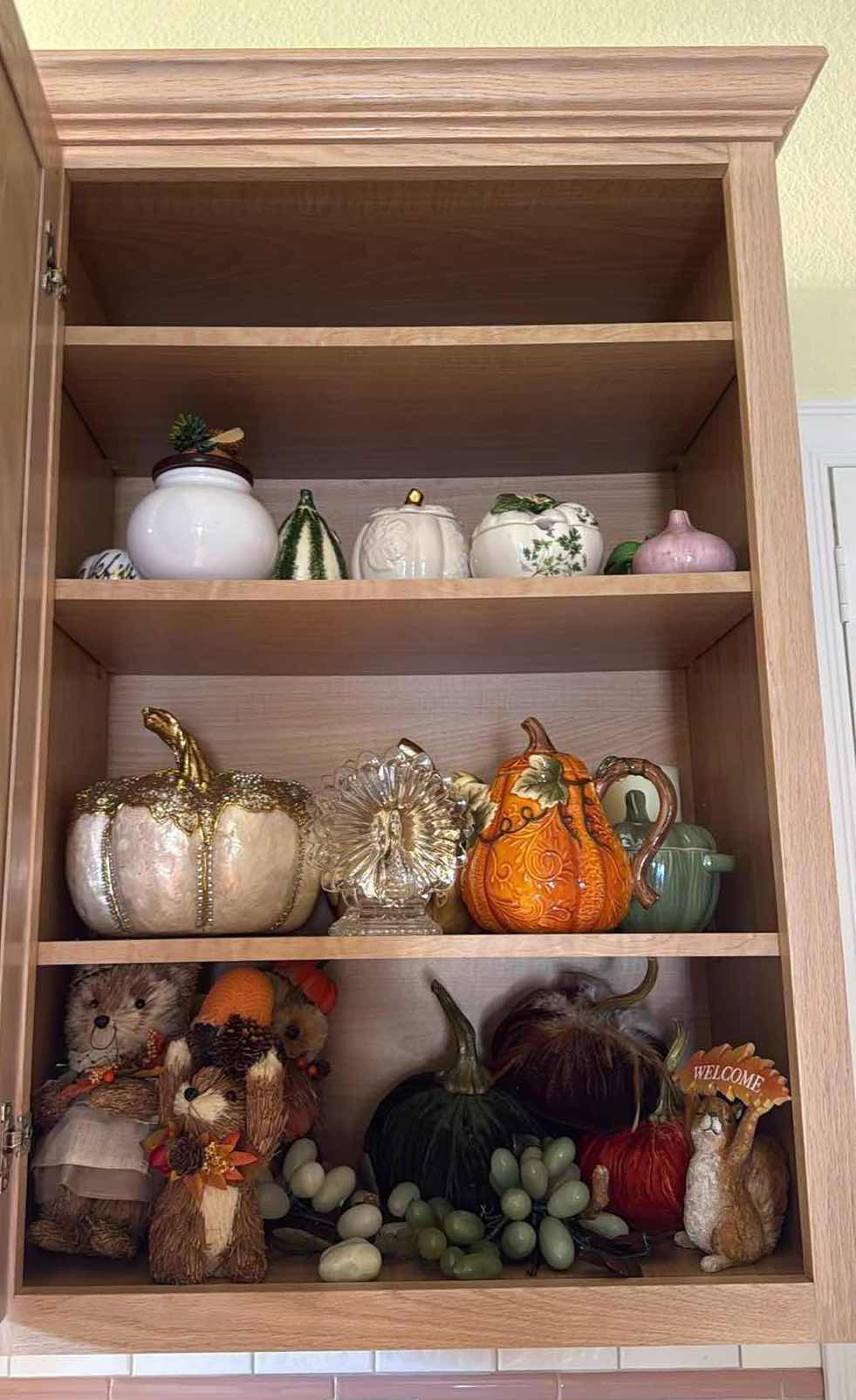 Photo 1 of CONTENTS OF KITCHEN CABINET – FALL DECOR