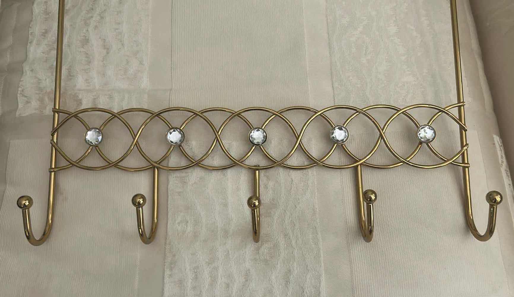 Photo 1 of 2- GOLD TONED OVER THE DOOR HANGER