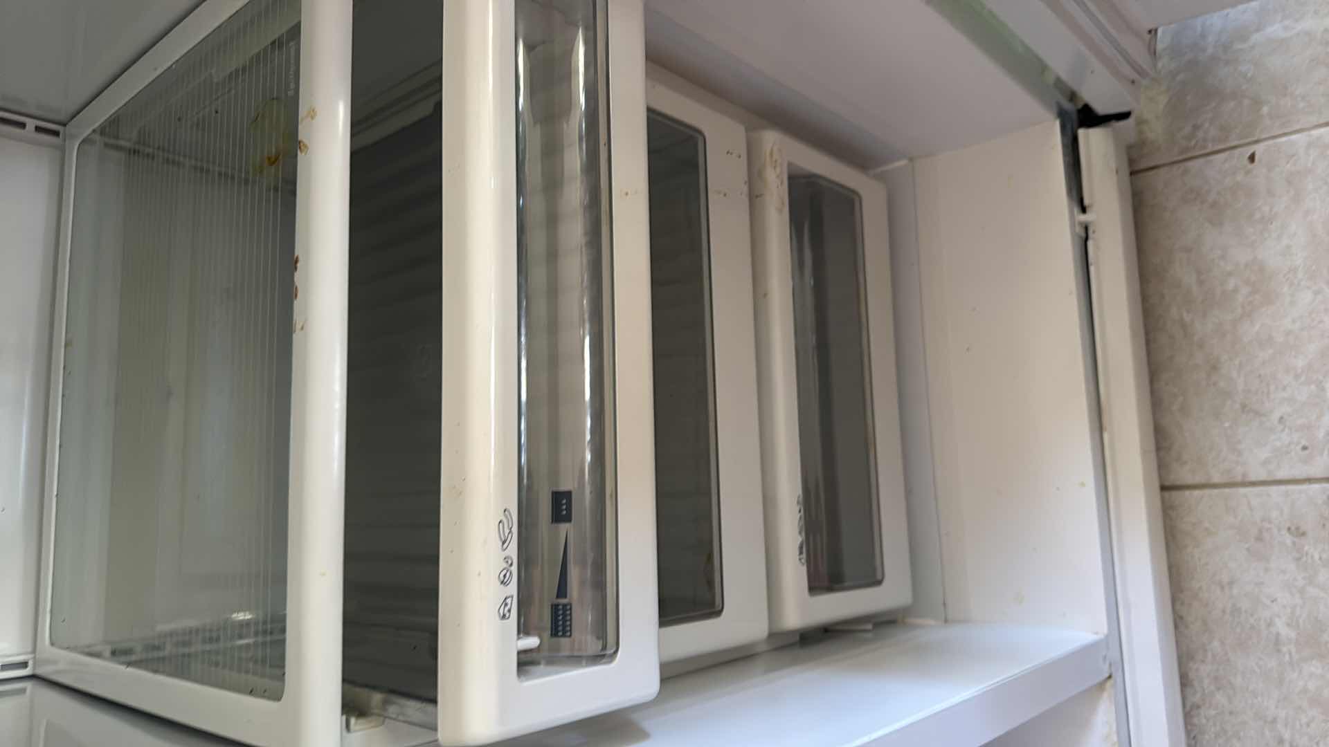 Photo 1 of WHITE GE PROFILE PERFORMANCE SIDE-BY-SIDE REFRIGERATOR