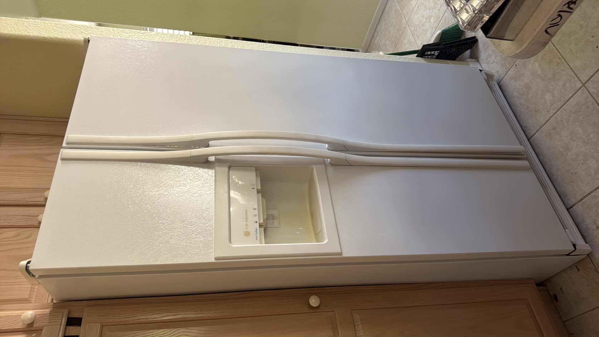 Photo 1 of WHITE GE PROFILE PERFORMANCE SIDE-BY-SIDE REFRIGERATOR