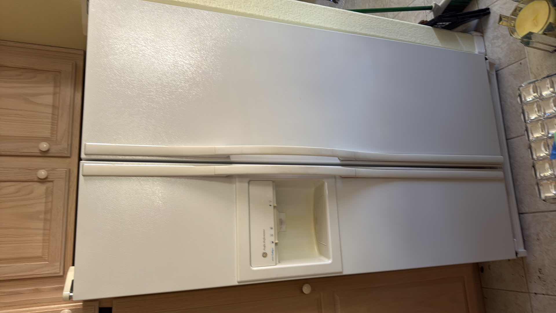 Photo 1 of WHITE GE PROFILE PERFORMANCE SIDE-BY-SIDE REFRIGERATOR
