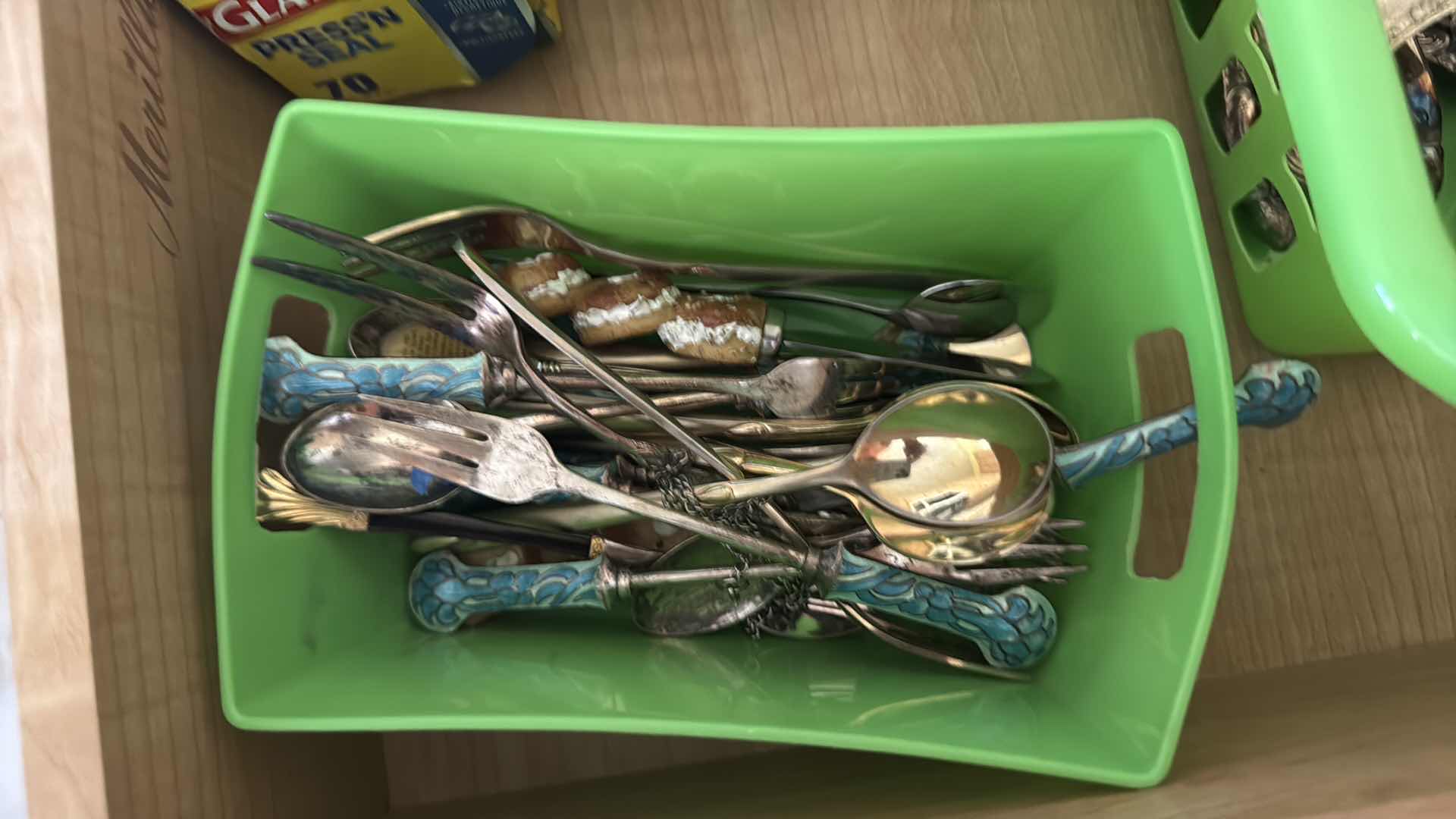 Photo 1 of CONTENTS OF KITCHEN DRAWER, SILVER-PLATED UTENSILS, STORAGE WRAP