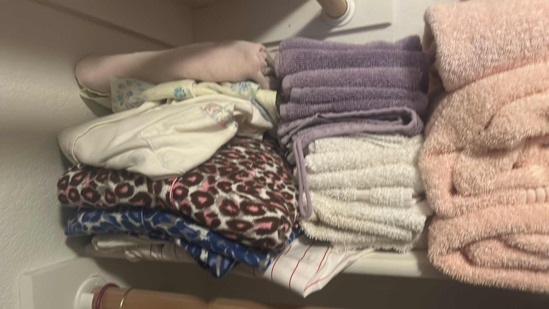 Photo 1 of SHELF OF TOWELS