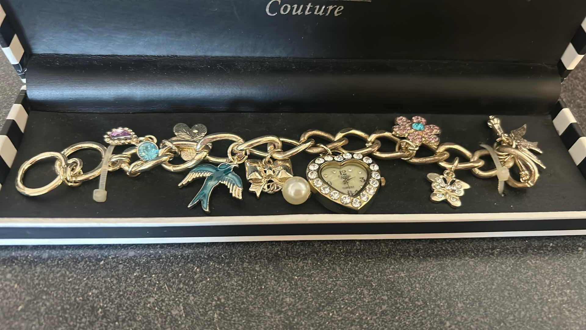 View 2 of FIGARO COUTURE CHARM BRACELET FEATURING A CENTRAL HEART SHAPED WATCH CHARM IN ORIGINAL BOX
