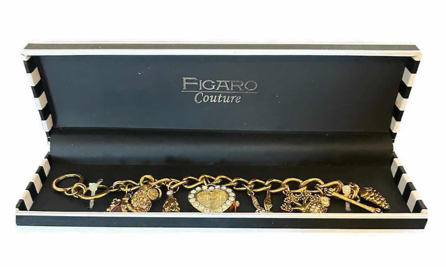 View 1 of FIGARO COUTURE CHARM BRACELET FEATURING A CENTRAL HEART SHAPED WATCH CHARM IN ORIGINAL BOX