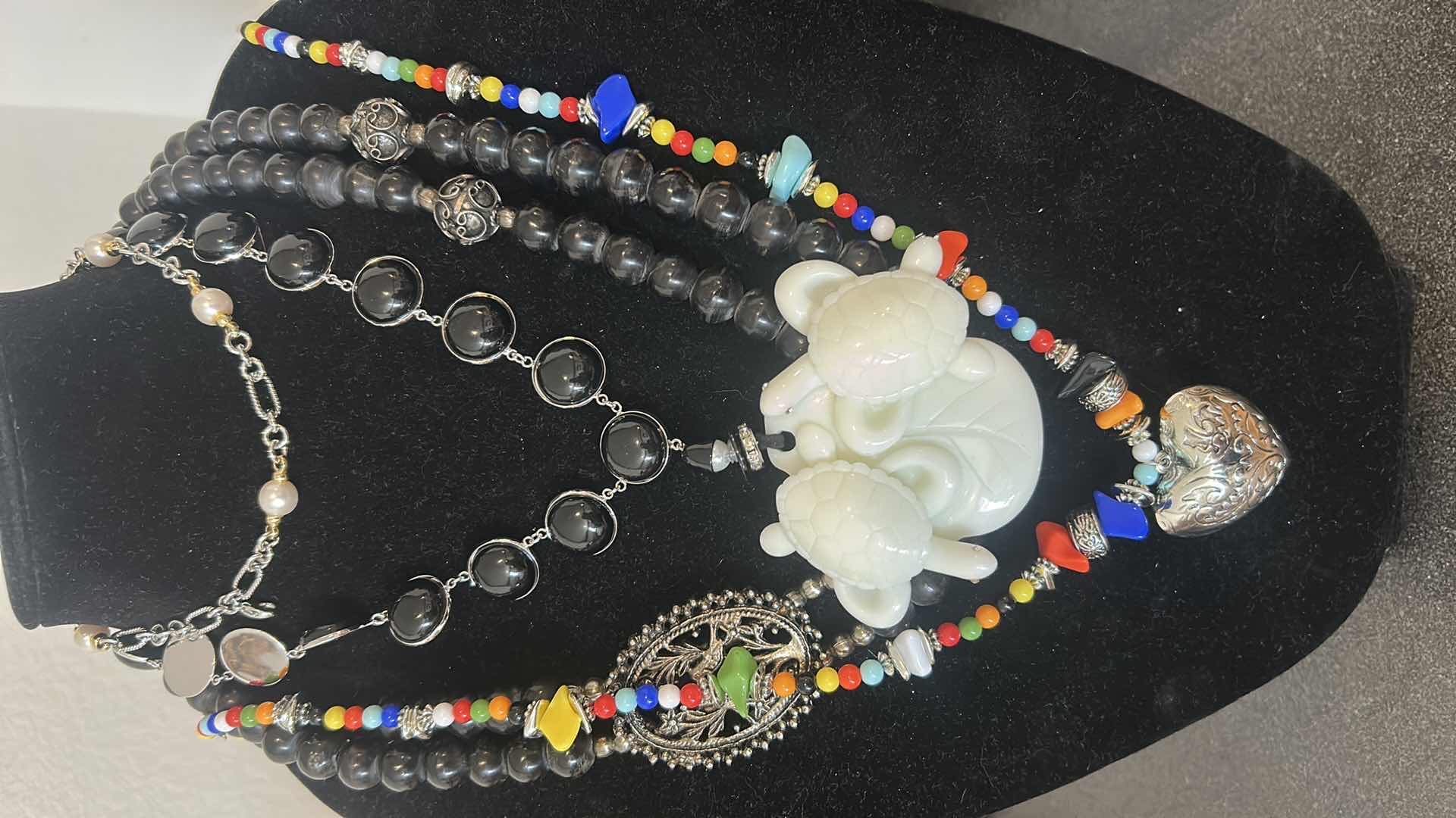 Photo 1 of 7- ASSORTMENT OF BEADED NECKLACES