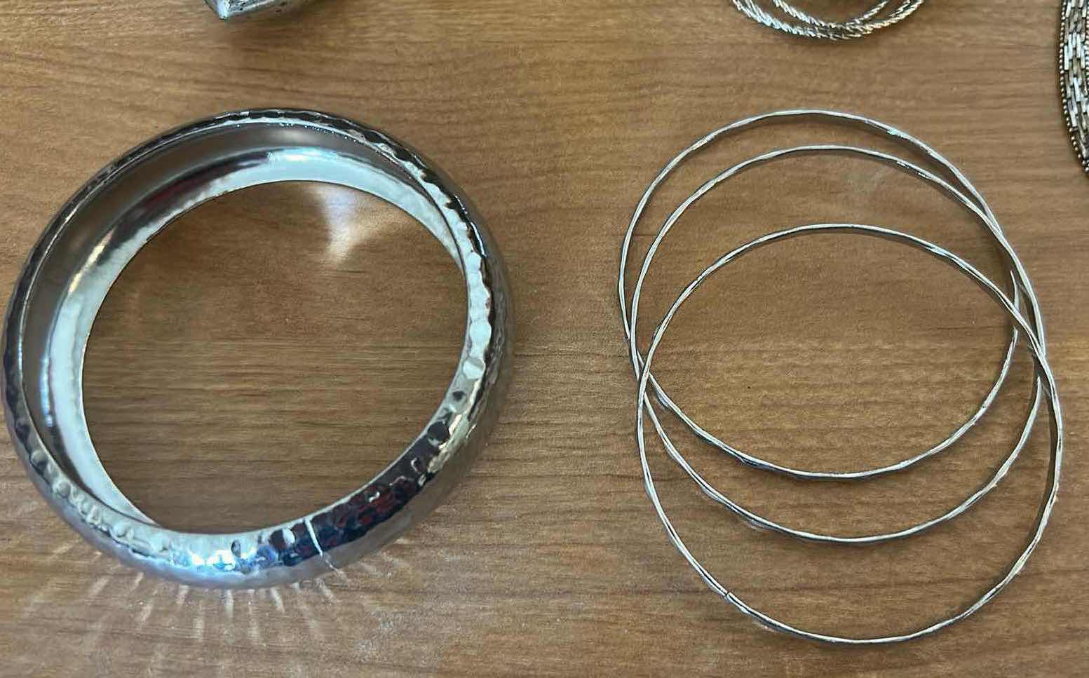 Photo 1 of 5- SILVER TONE BRACELETS AND METAL BANGLES