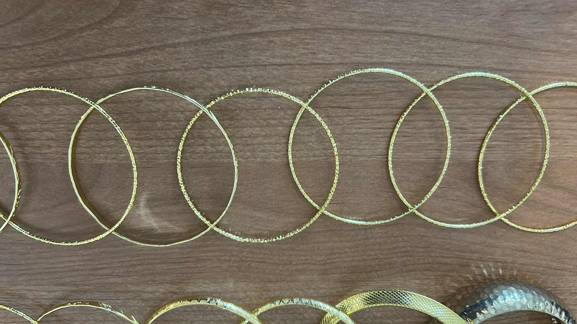 Photo 1 of 13- ASSORTMENT OF GOLD TONE BANGLES