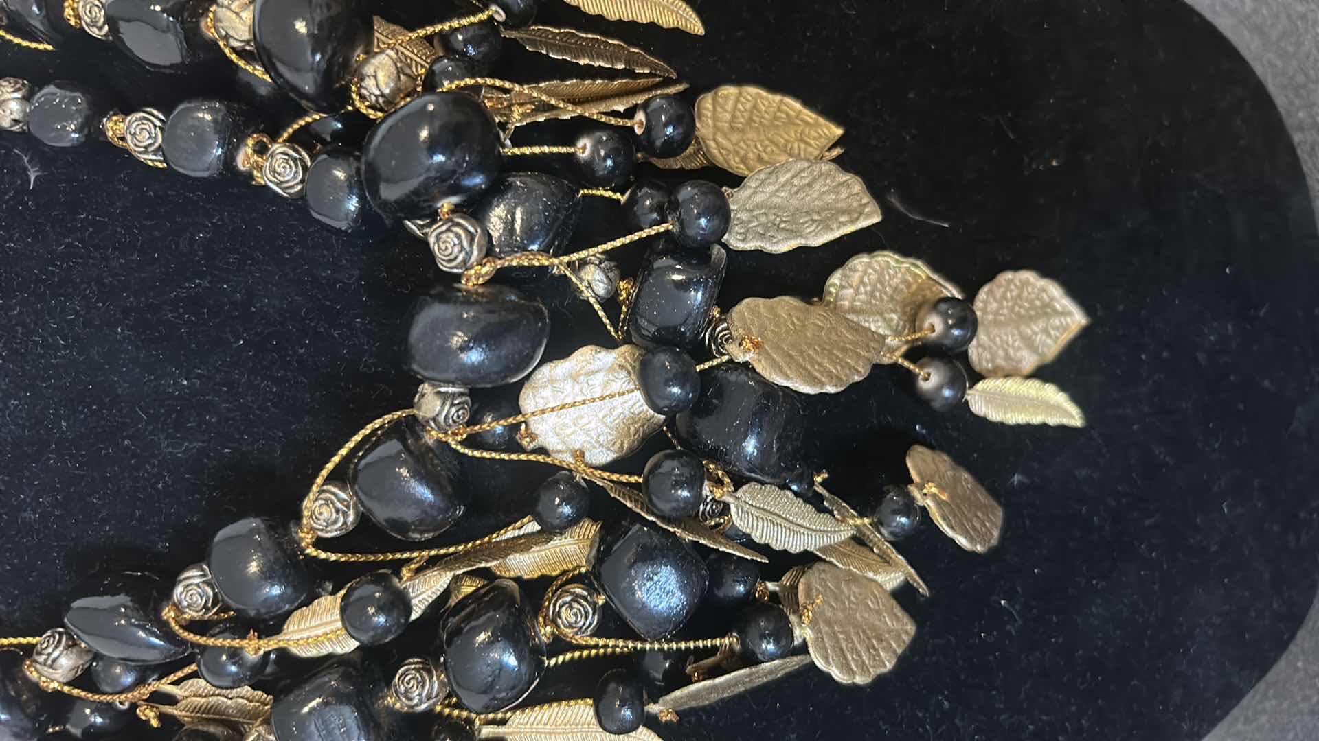Photo 1 of VINTAGE HANDMADE STATEMENT NECKLACE W BLACK GLASS BEADS AND GOLD TONE BRASS LEAVES MULTI STRAND