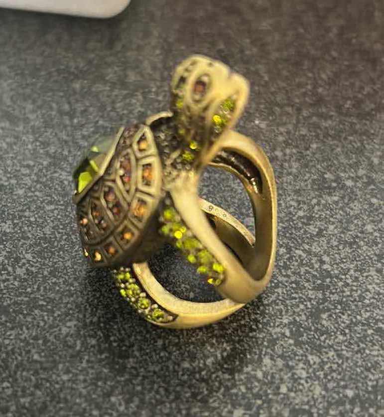 Photo 1 of HEIDI DAUS " SLOW POKE" TUTRLE RING W OLIVE GREEN & TOPAZ CRYSTALS SIZE 7 $90