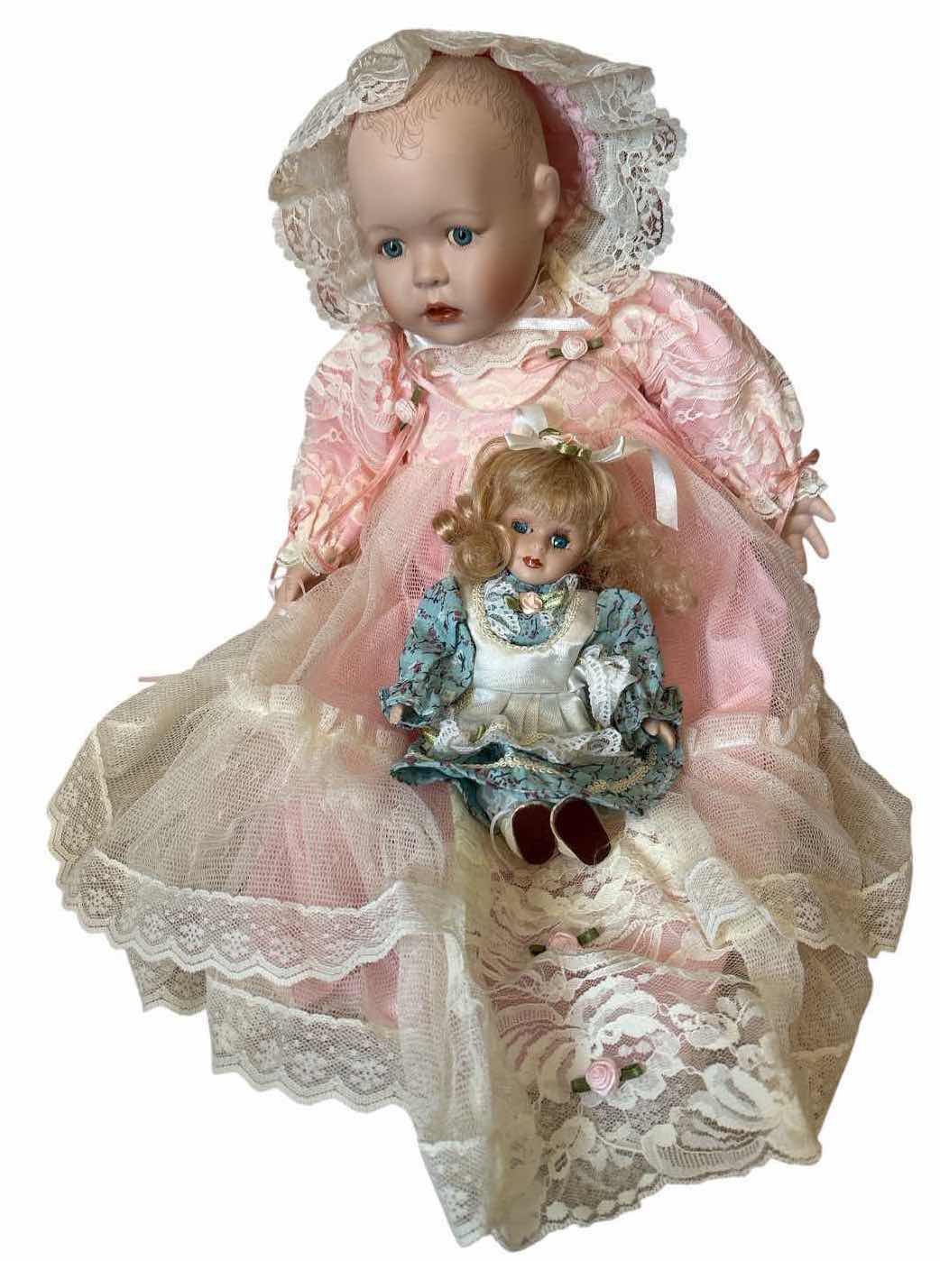 Photo 1 of (2)PCS VINTAGE STYLE PORCELAIN DOLLS -PINK LONG DRESS AND BLUE FLORAL DRESS H16.5” $110