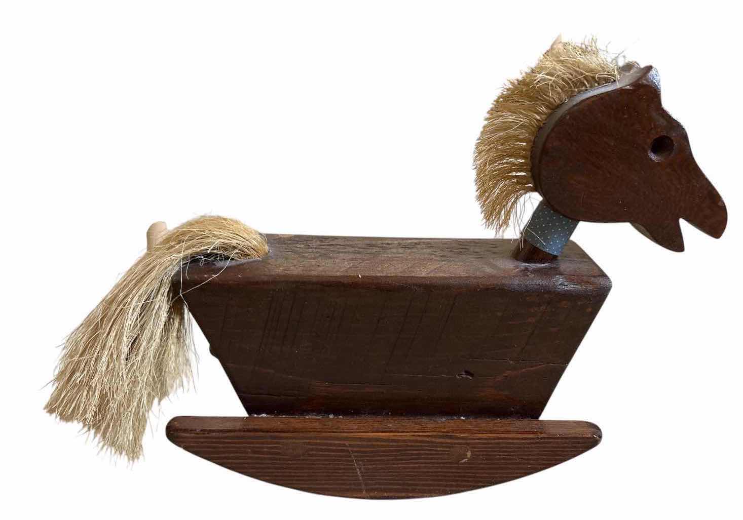 Photo 1 of WICKER DOLL CRADLE ON STAND, HANDCRAFTED WOODEN ROCKING HORSE, AND A WHITE RUSH SEAT CHILDS CHAIR 19”X13”H29” $160