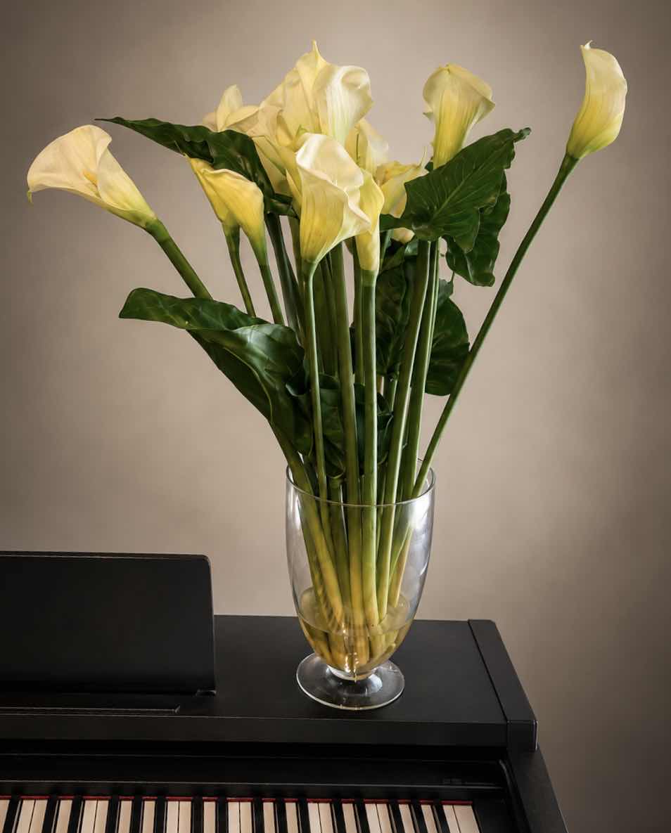 View 1 of FAUX WHITE CALLA LILLY FLORAL ARRANGEMENT H34”