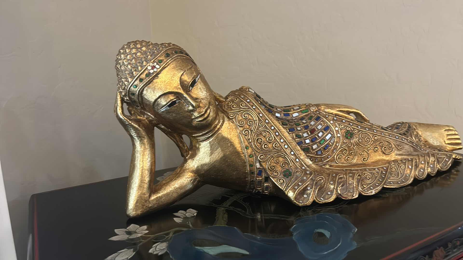 View 3 of HAND CARVED WOODEN RECLINING BUDDHA SCULPTURE,GOLD GILT FINISH W INLAID MIRROR GLASS 26” x H9”
