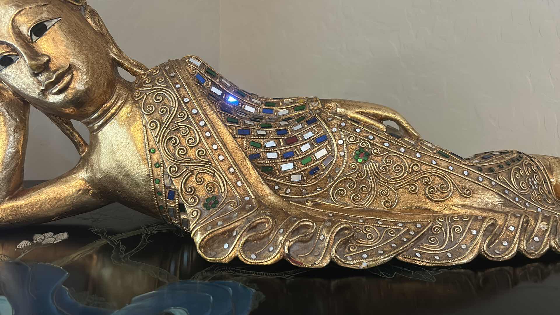 View 4 of HAND CARVED WOODEN RECLINING BUDDHA SCULPTURE,GOLD GILT FINISH W INLAID MIRROR GLASS 26” x H9”