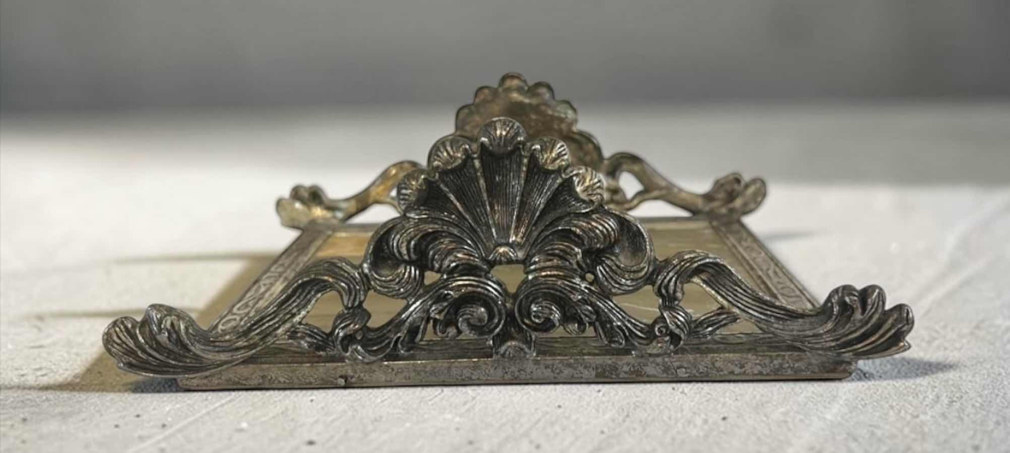 Photo 1 of ORNATE GODINGER VINTAGE SILVER PLATED NAPKIN HOLDER/KNIFE REST WITH ROCOCO STYLE, SCROLL WORK. 8 1/2” x 5 1/2” x H3” $50