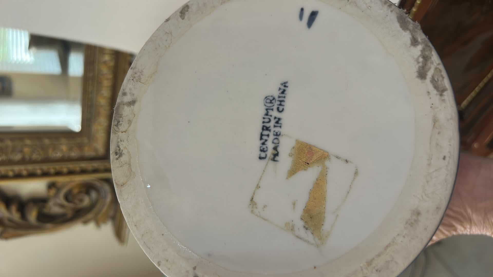 Photo 1 of THE ESTIMATED RESALE PRICE FOR THIS CENTRUM BLUE AND WHITE PORCELAIN BUCKET IS BETWEEN $35 AND $65. seven and three-quarter inches