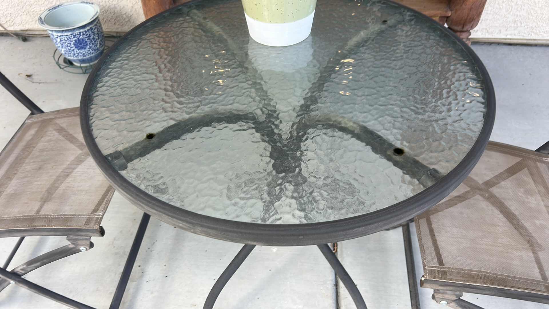 View 4 of METAL BISTRO TABLE WITH WAVY GLASS TOP AND TWO CHAIR CHAIRS.