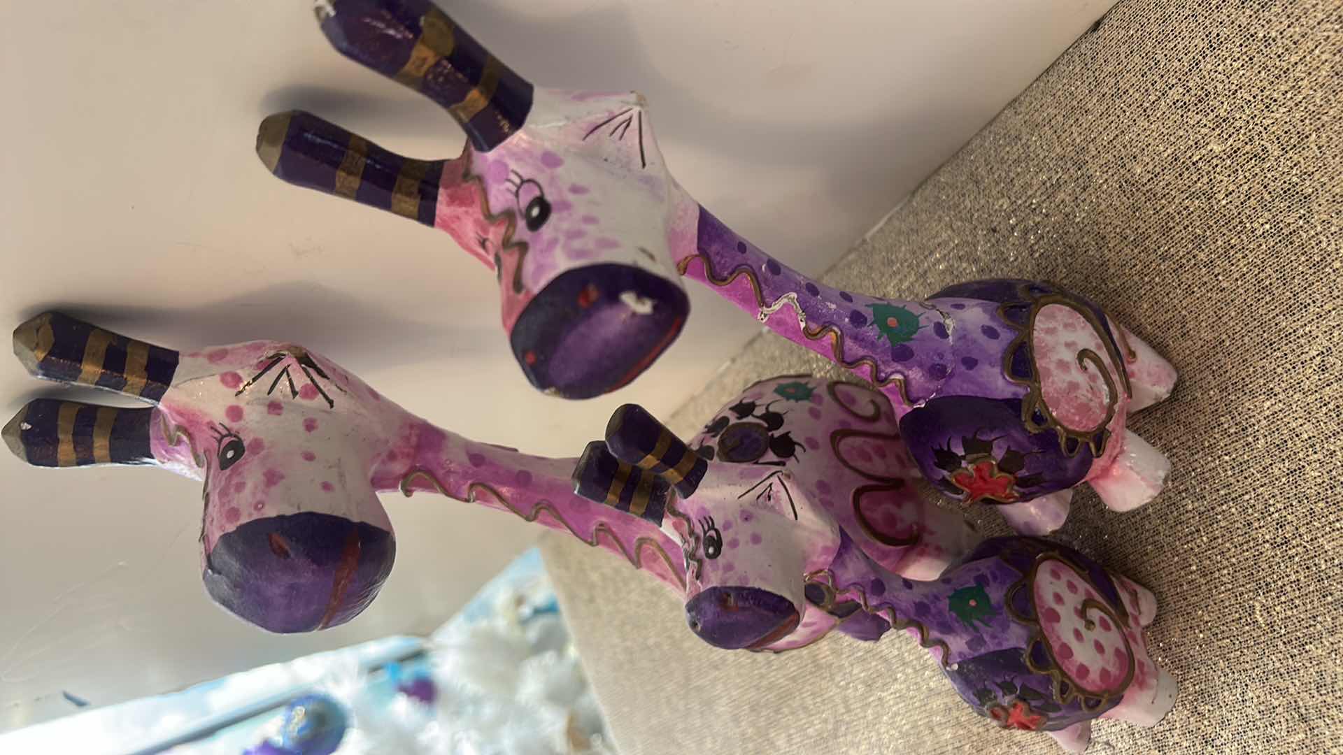 Photo 1 of HANDMADE 3-PIECE WHIMSICAL PURPLE GIRAFFE STATUE SET, TALLEST H10”