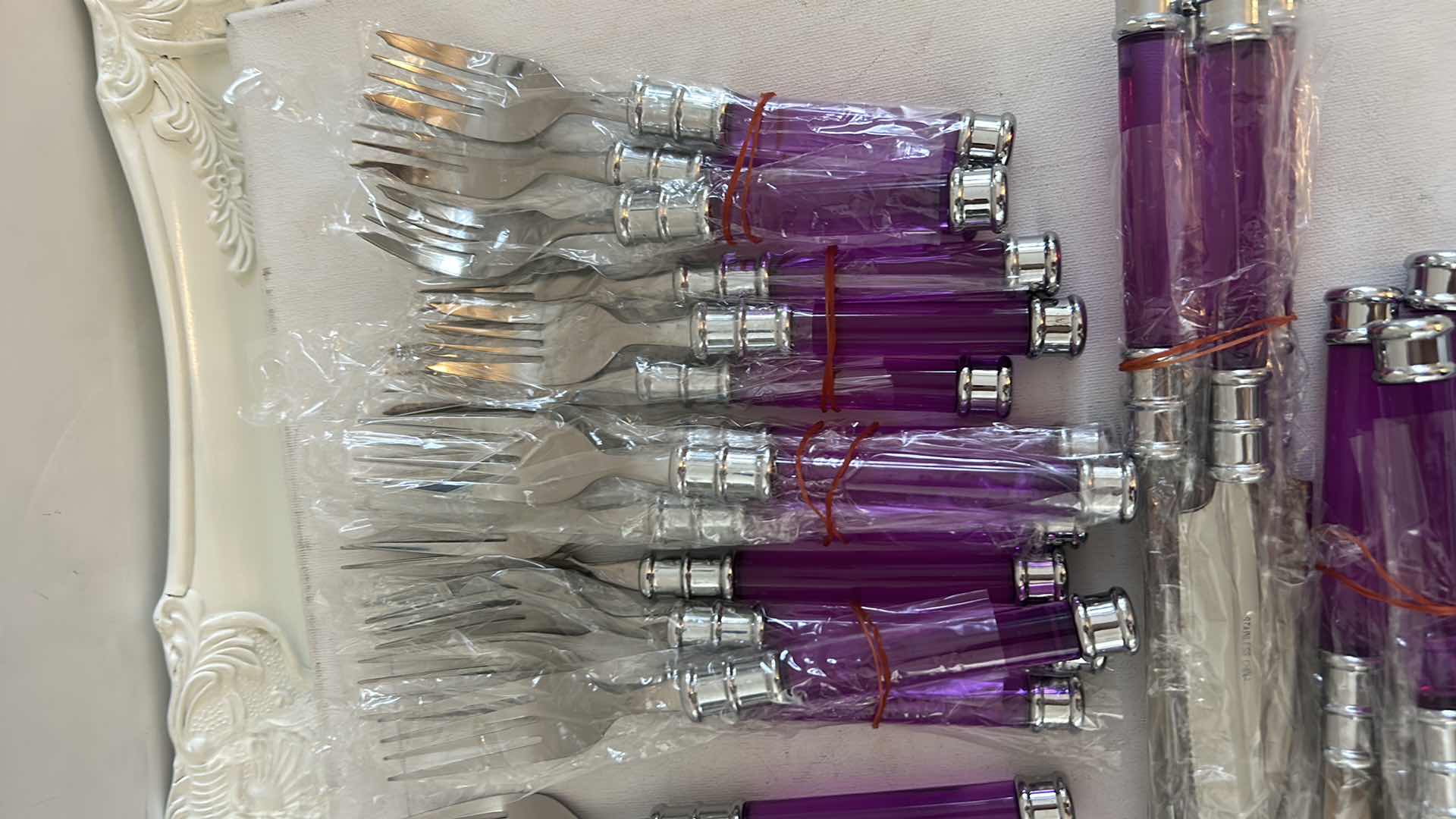 Photo 1 of 40 PC PURPLE HANDLED, STAINLESS STEEL FLATWARE & CUTLERY SET