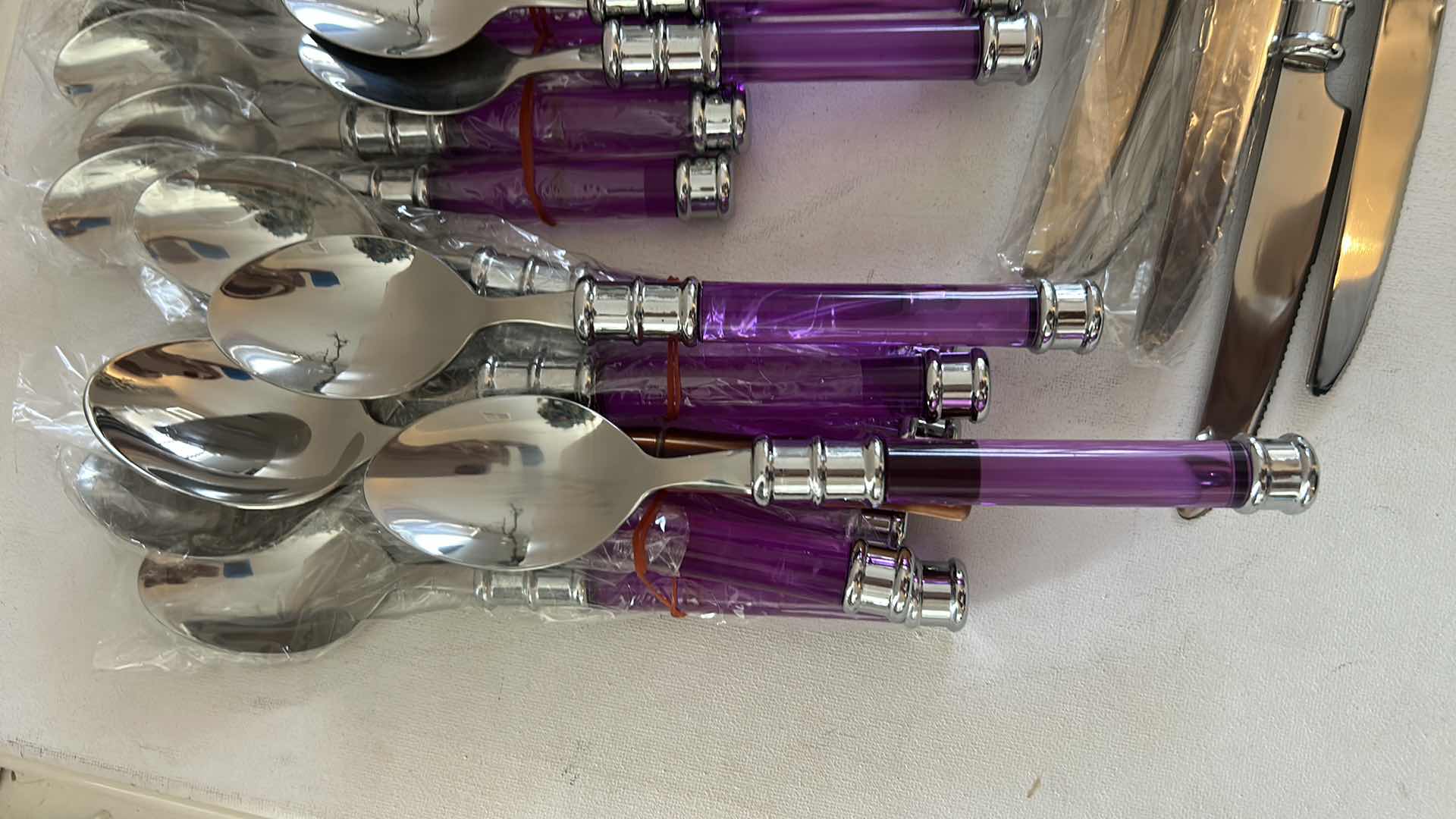 Photo 1 of 40 PC PURPLE HANDLED, STAINLESS STEEL FLATWARE & CUTLERY SET
