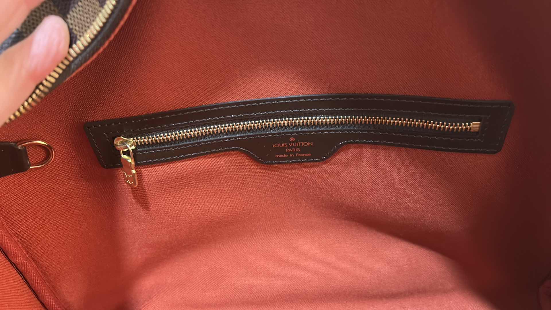 Photo 1 of AUTHENTICATED LOUIS VUITTON: DAMIER EBENE NOLITA BAG