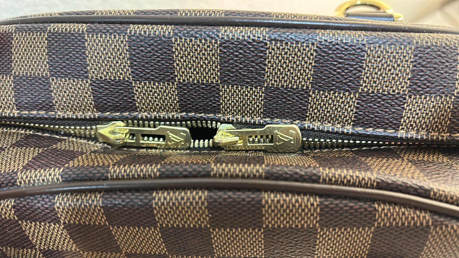 Photo 1 of AUTHENTICATED LOUIS VUITTON: DAMIER EBENE NOLITA BAG