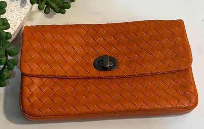Photo 1 of BOTTEGA VENETA: VINTAGE ORANGE INTRECCIATO LEATHER TURN-LOCK CLUTCH BAG