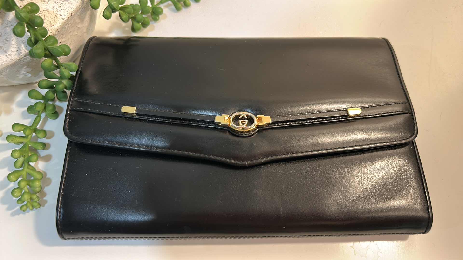 Photo 1 of AUTHENTIC GUCCI: VINTAGE BLACK SMOOTH LEATHER HORSEBIT ENVELOPE CLUTCH BAG