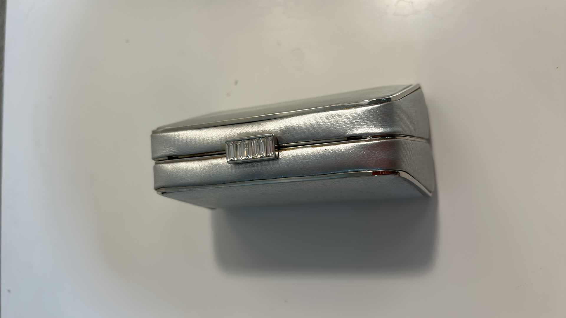 Photo 1 of SMALL ST JOHN SILVER METALLIC EVENING CLUTCH BAG