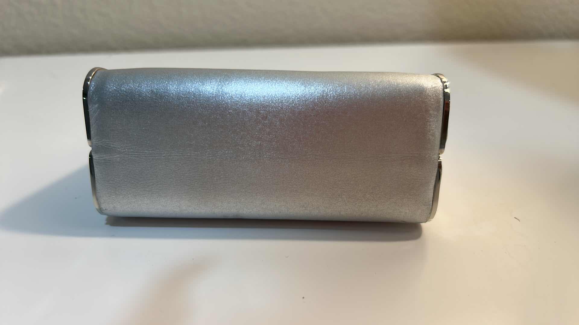 Photo 1 of SMALL ST JOHN SILVER METALLIC EVENING CLUTCH BAG