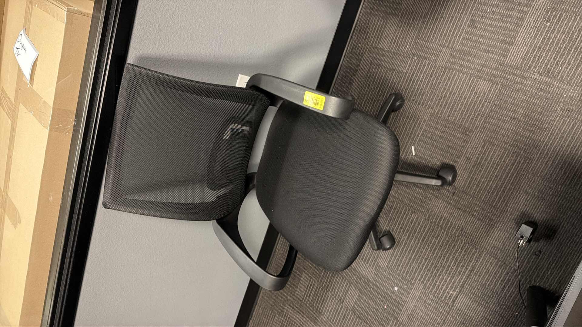 Photo 1 of Black mesh task chair