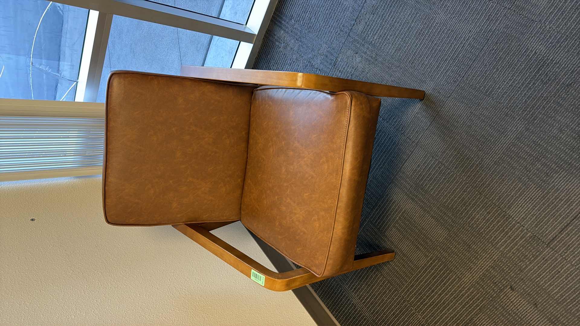 View 1 of Brown leather lounge chair