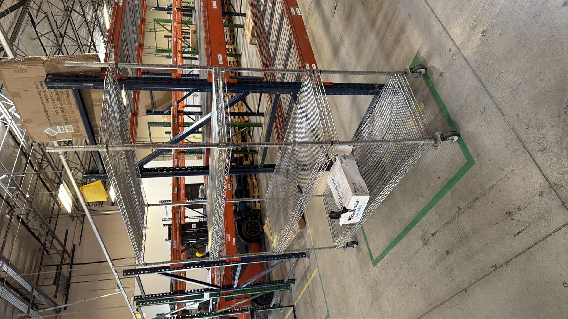 Photo 1 of Rolling industrial shelving