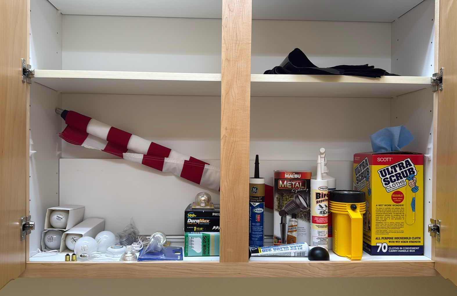 Photo 1 of CONTENTS OF LAUNDRY ROOM CABINET-MISC SUPPLIES,AMERICAN FLAG