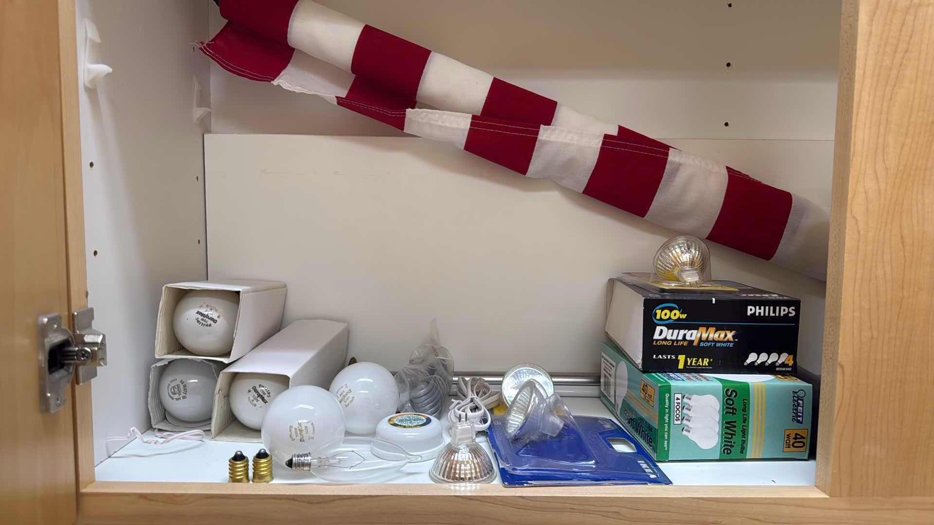 Photo 1 of CONTENTS OF LAUNDRY ROOM CABINET-MISC SUPPLIES,AMERICAN FLAG