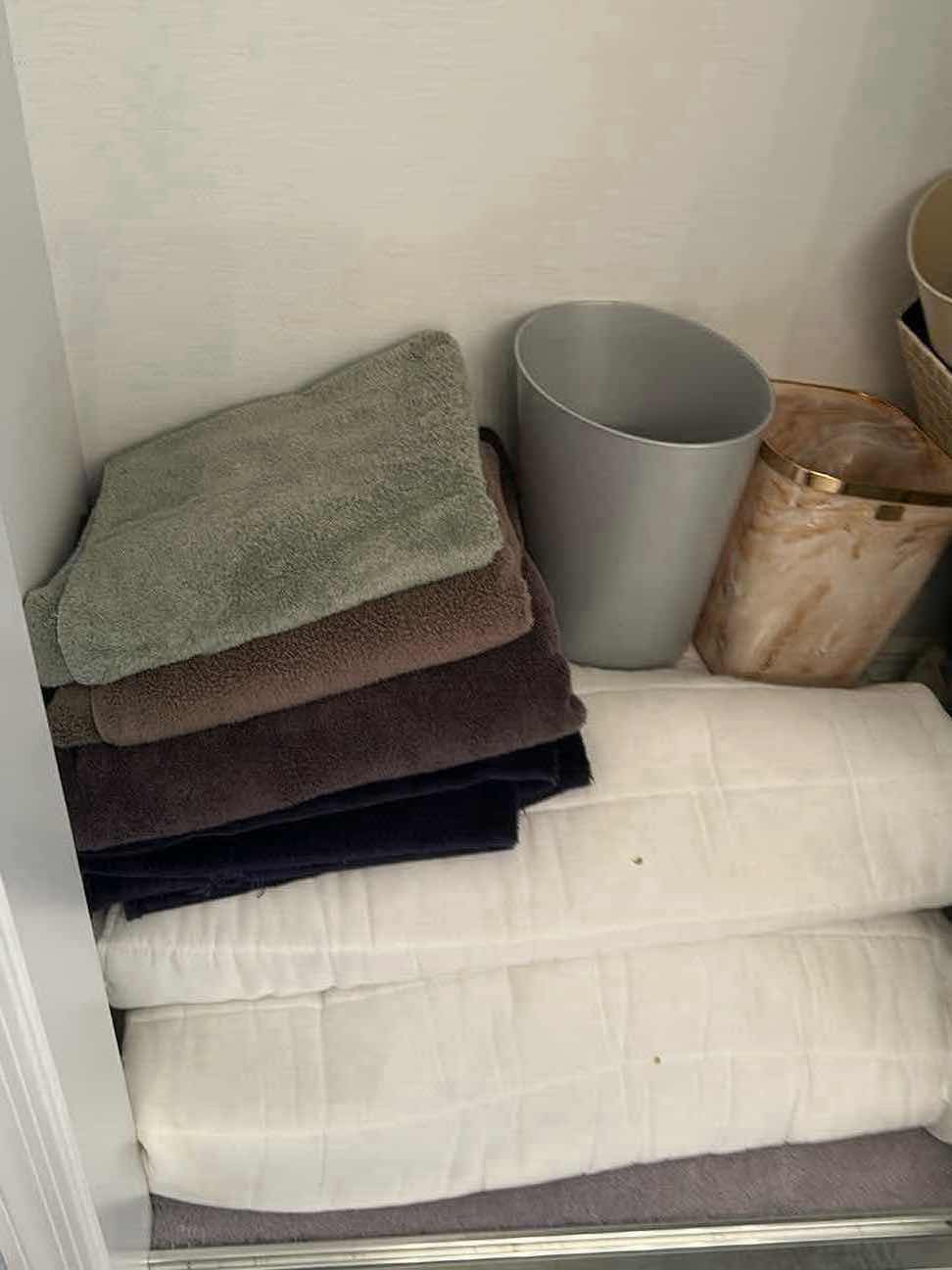 Photo 1 of CONTENTS OF CLOSET PILLOWS SHEETS TOWELS TRASH CANS
