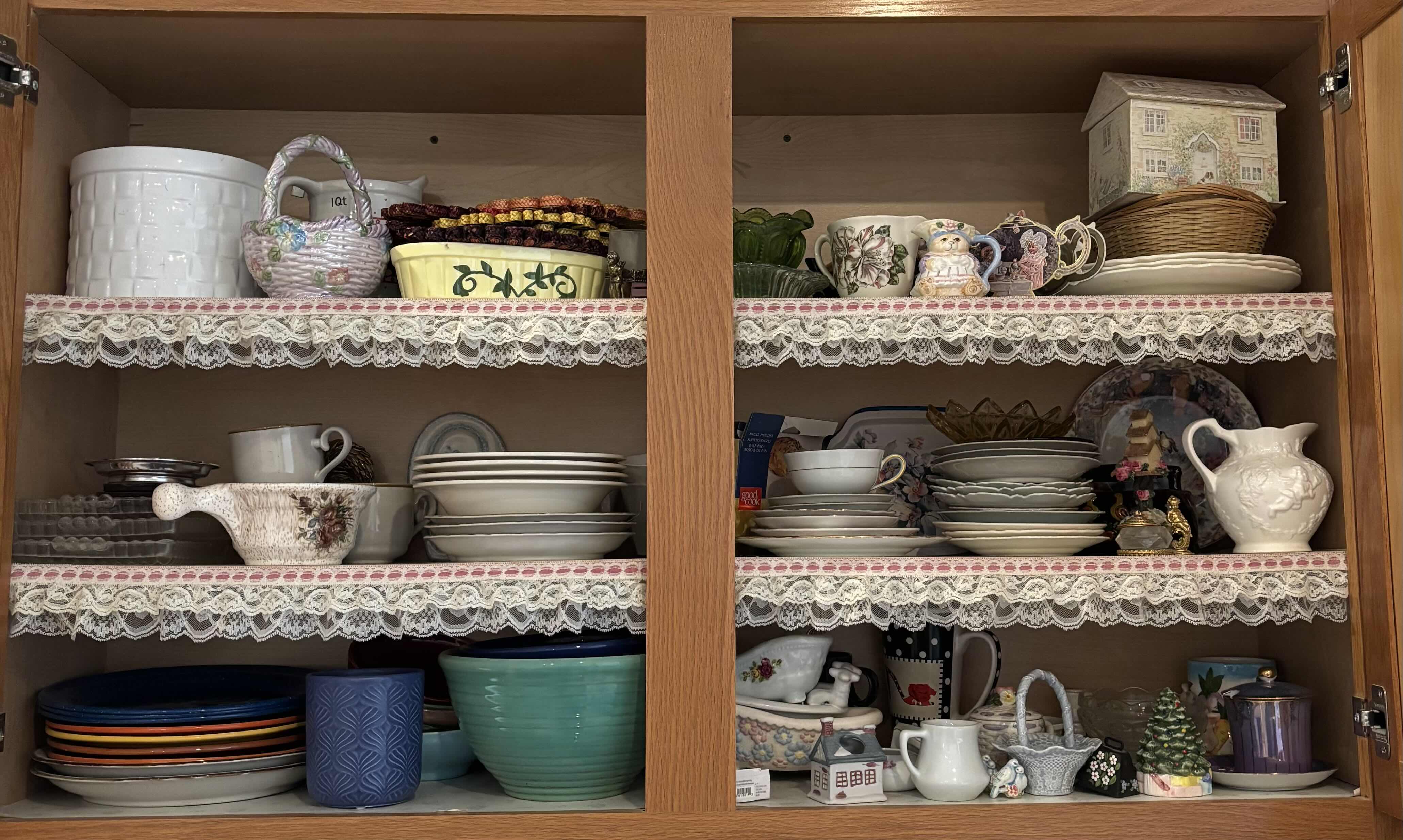 Photo 1 of CONTENTS OF KITCHEN CABINET