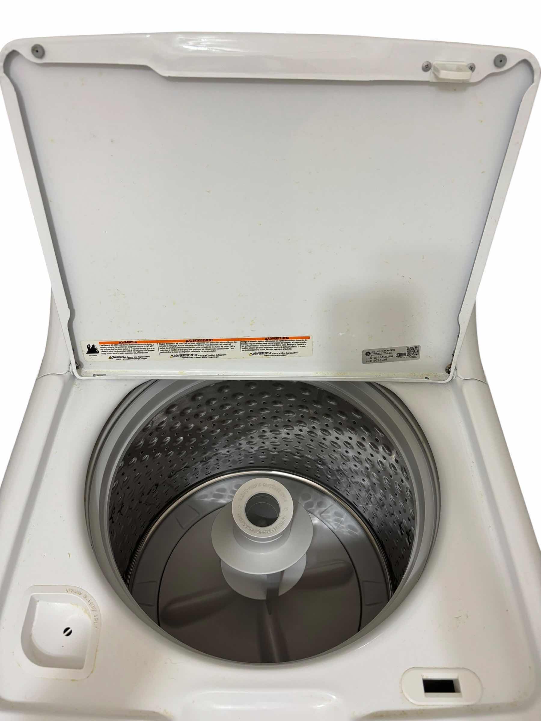 Photo 1 of WHITE GE TOP LOAD WASHER MODEL GTW335ASN2WW