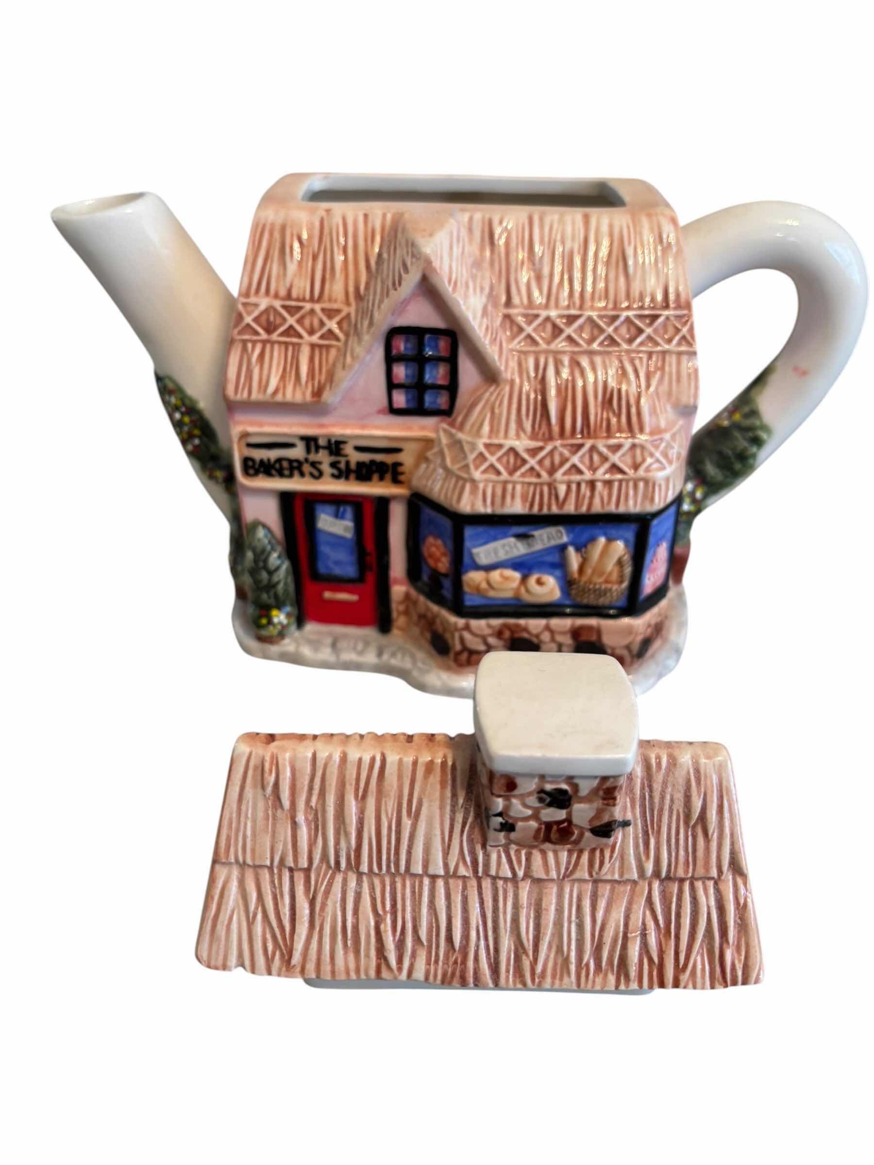 Photo 1 of COLLECTIBLE CERAMIC TEA POTS (3)