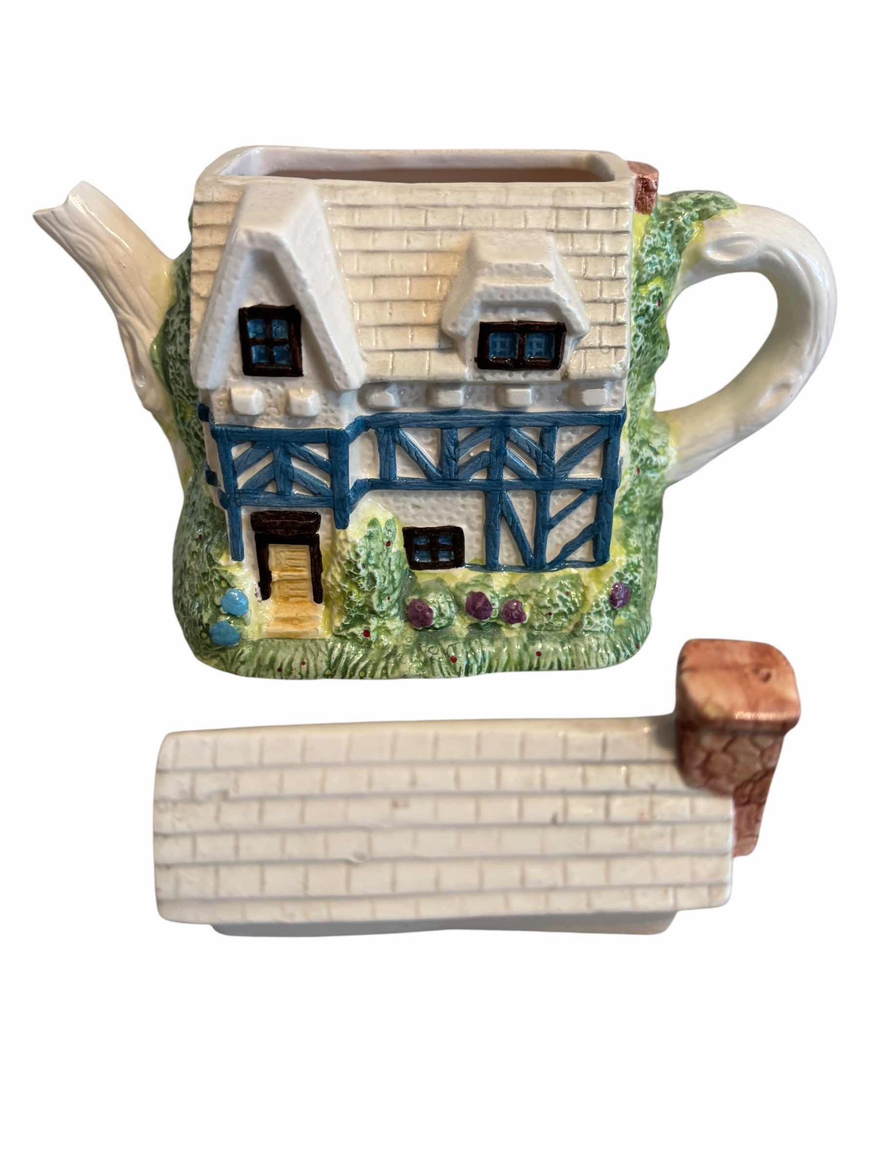 Photo 1 of COLLECTIBLE CERAMIC TEA POTS (3)