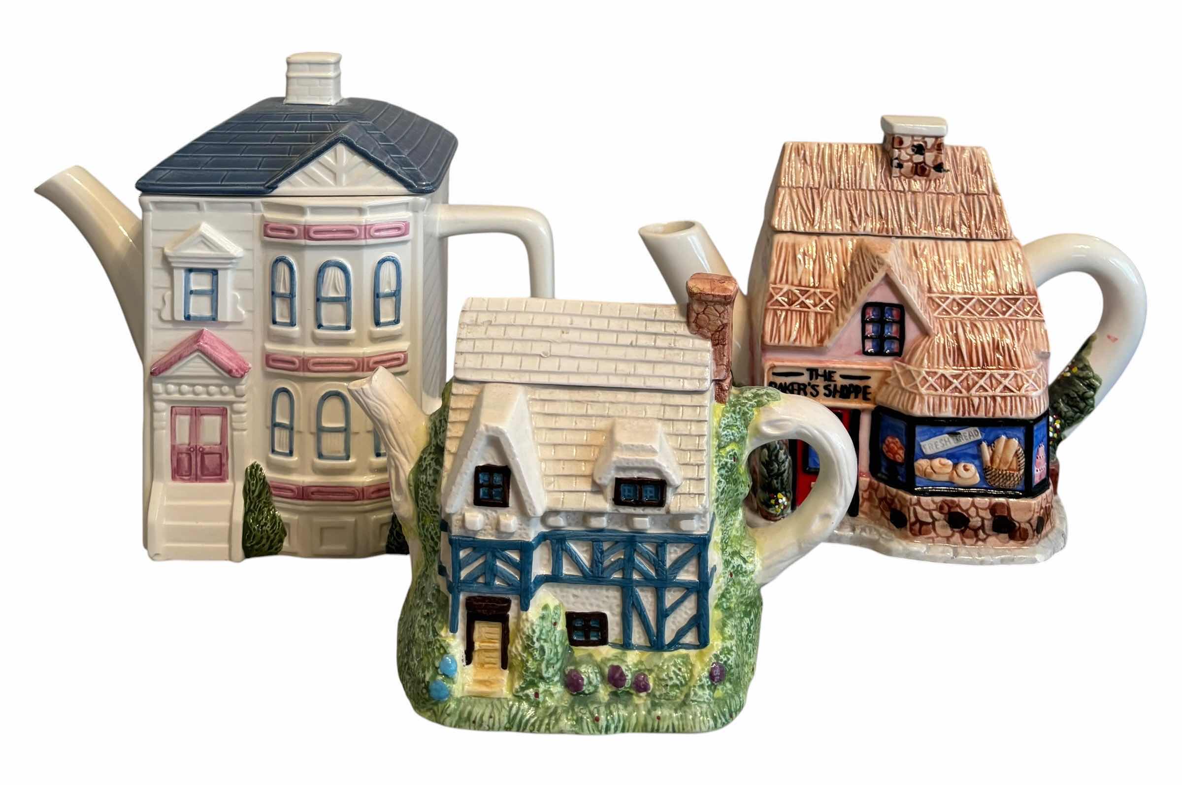 Photo 1 of COLLECTIBLE CERAMIC TEA POTS (3)